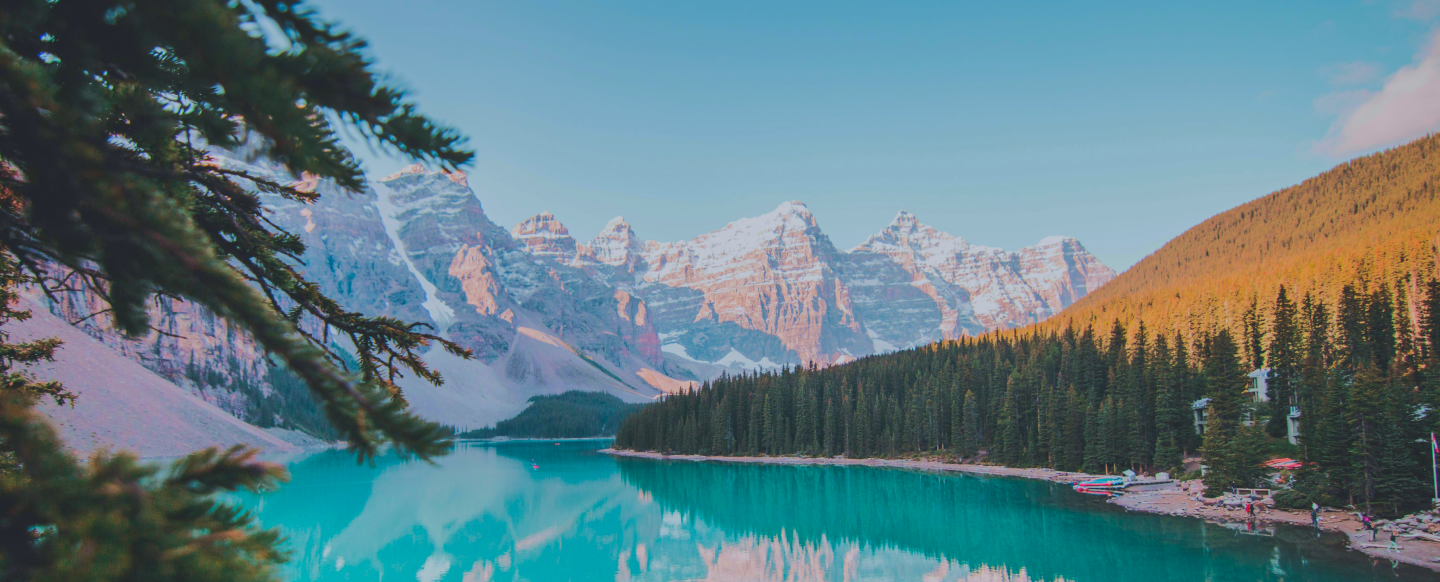 Snowy Mountains by a lake photo